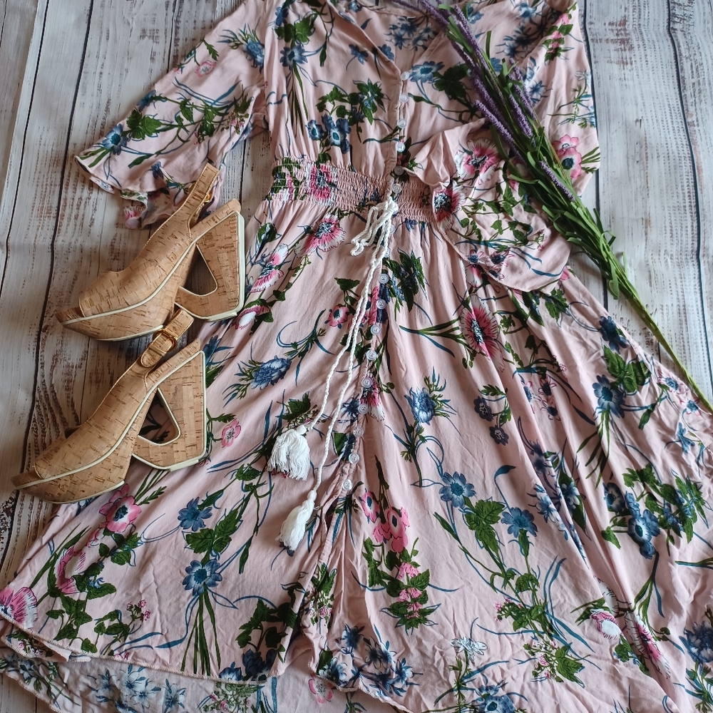 short summer or spring dress. light fabric with a slight bell sleeve.